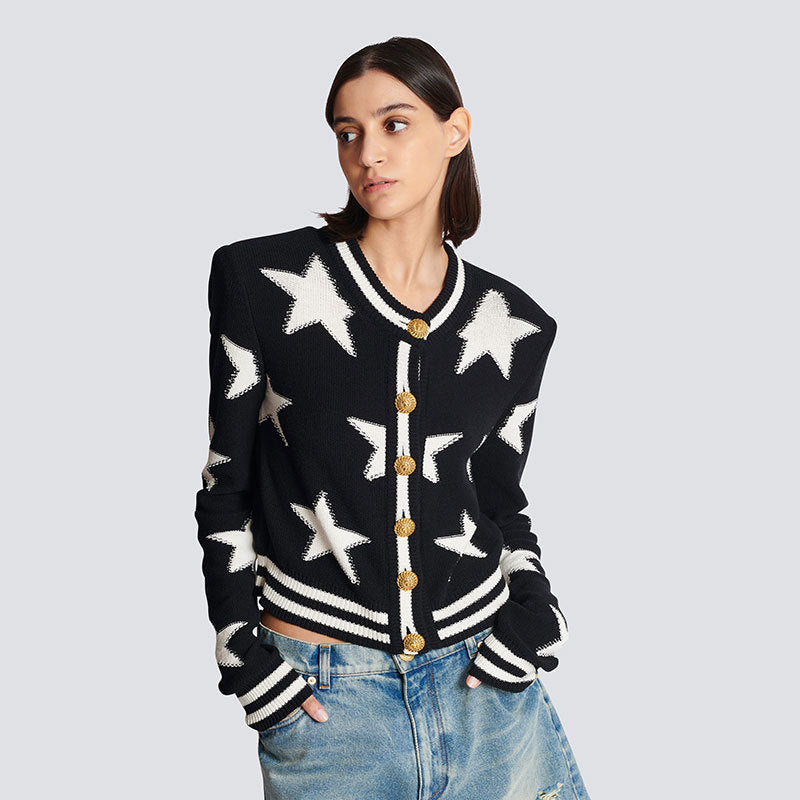A chanel-style shoulder-padded knitted cardigan