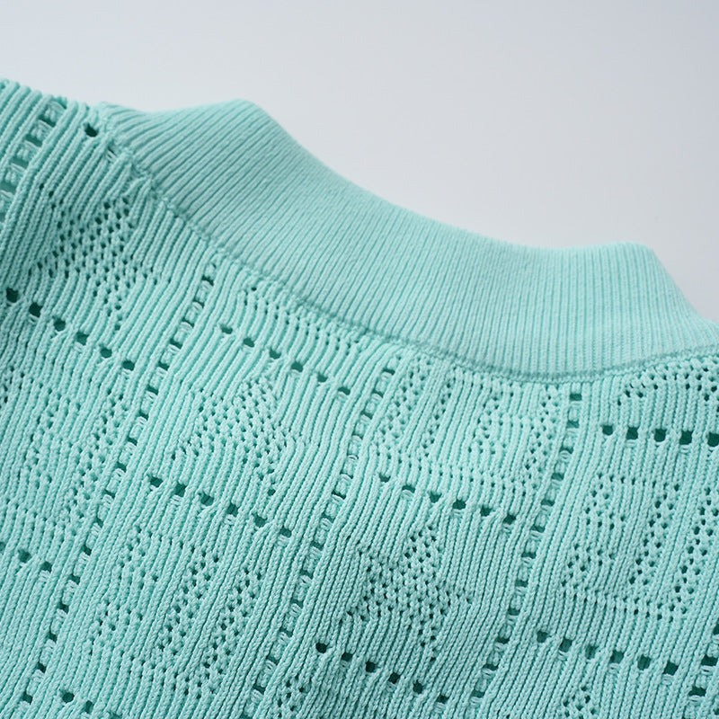 A small chanel-style jade button letter hollowed-out knitted cardigan