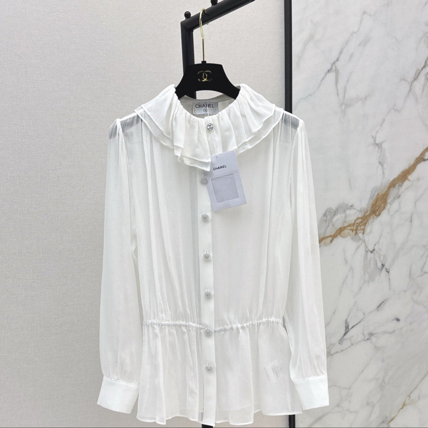 C 25ss See-through ruffled top