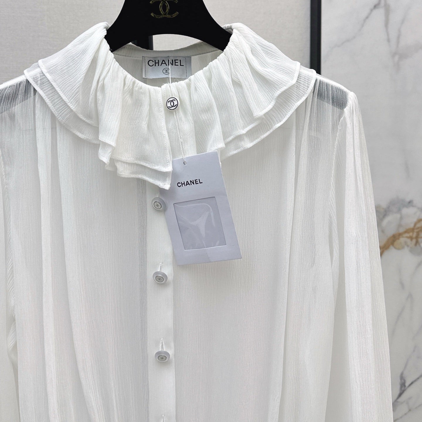 C 25ss See-through ruffled top