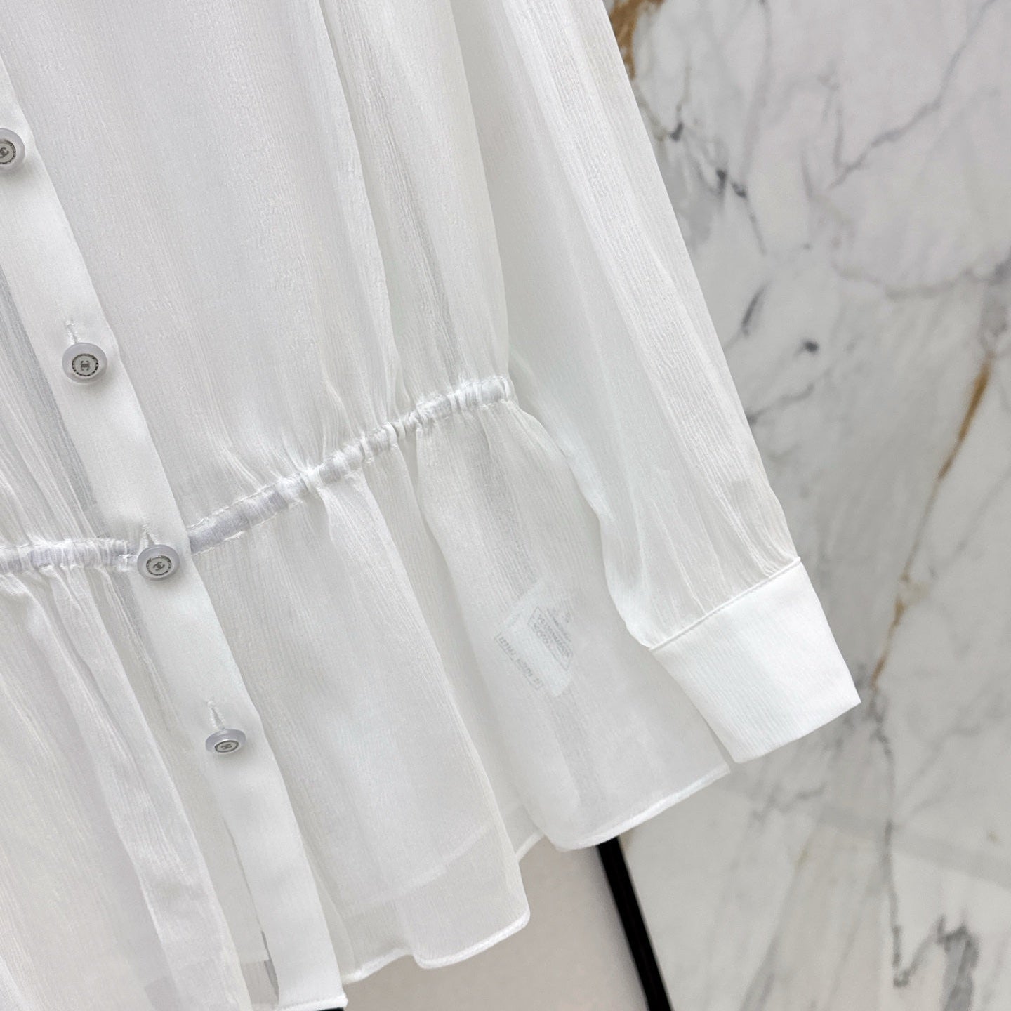 C 25ss See-through ruffled top