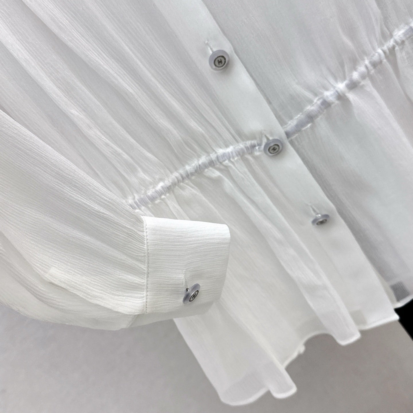 C 25ss See-through ruffled top