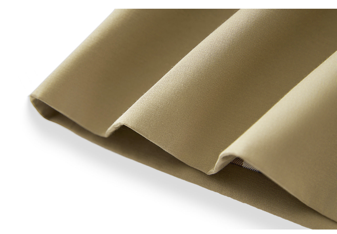 25ss A long, loose coat with a British check patchwork lapel