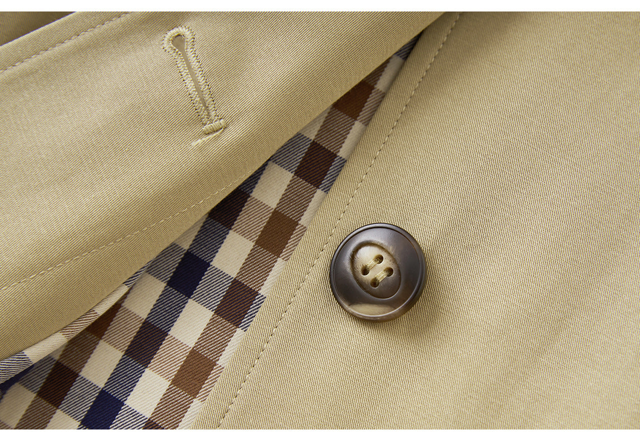 25ss A long, loose coat with a British check patchwork lapel